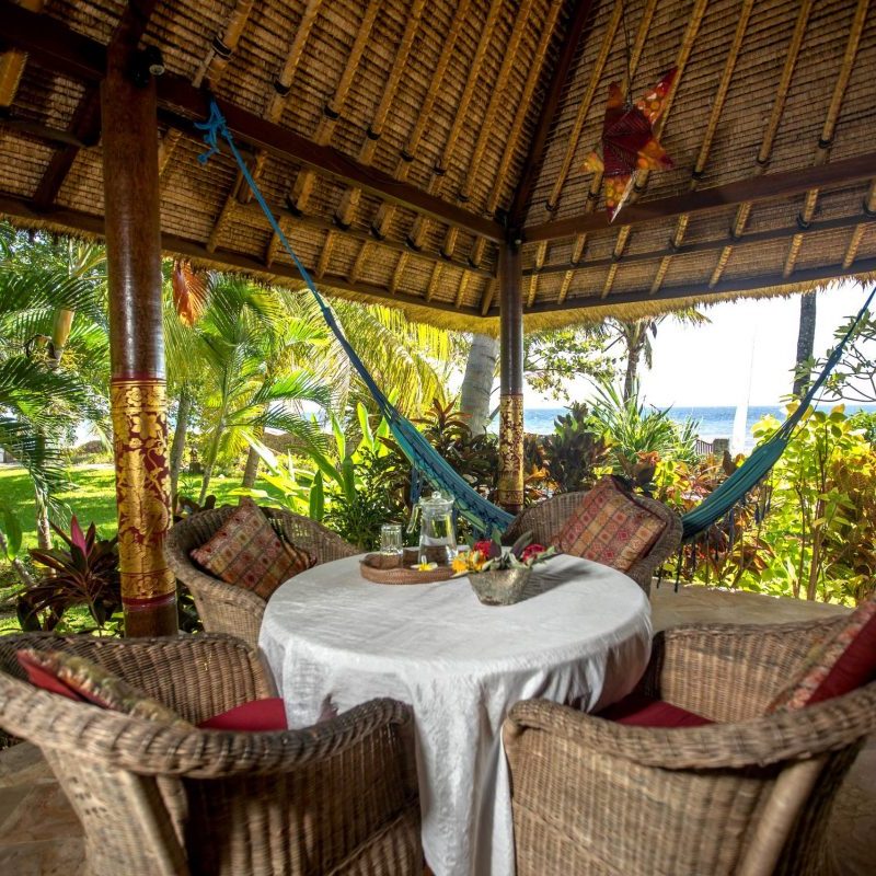 Private Terrasse of our Orchid Room with a ocean view and garden site